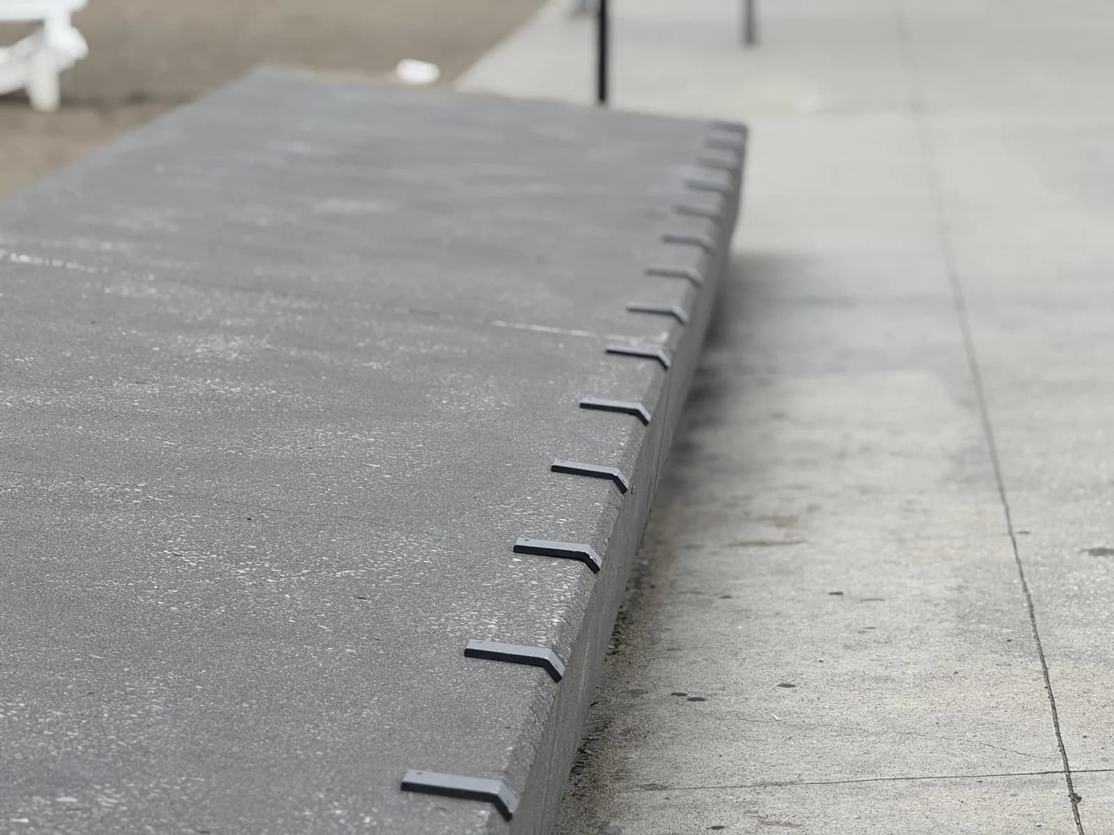 Skateboard Deterrents for Ledges installed in a Canadian commercial setting — stainless skateboard deterrent hardware